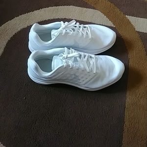 White women's Nike tennis shoe